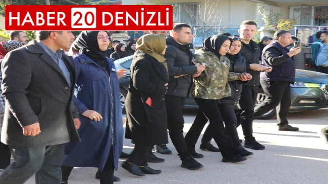 Şehit eşini askeri kamuflajla uğurladı