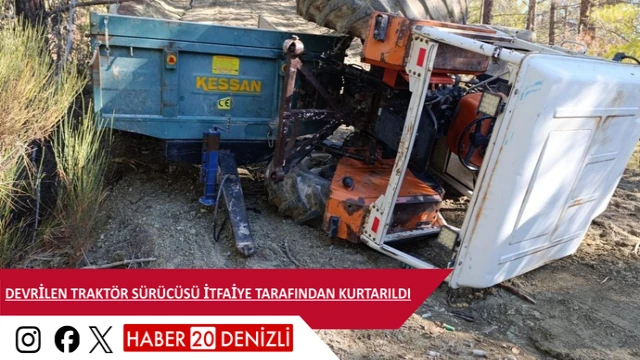 Devrilen traktör sürücüsü itfaiye tarafından kurtarıldı