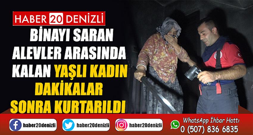 Binayı saran alevler arasında kalan yaşlı kadın dakikalar sonra kurtarıldı