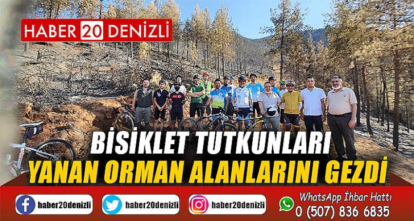 Bisiklet tutkunları yanan orman alanlarını gezdi