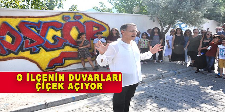 O İLÇENİN DUVARLARI ÇİÇEK AÇIYOR