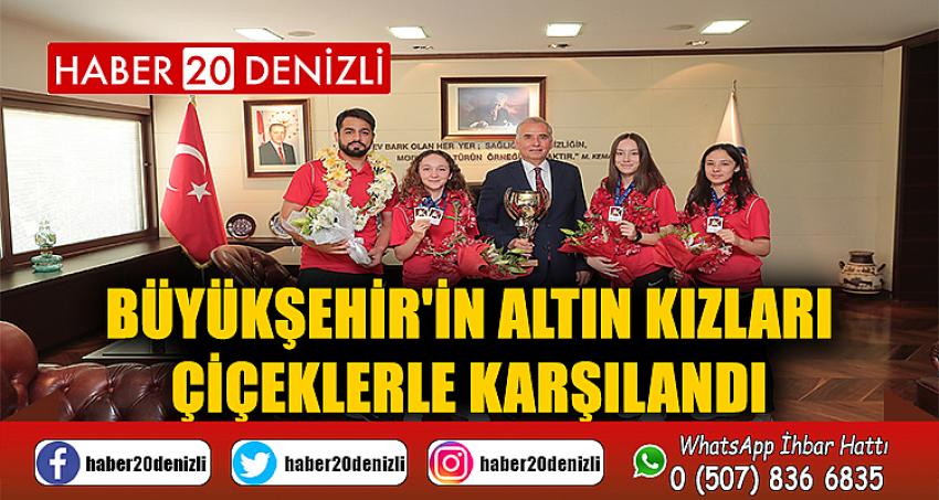 Büyükşehir'in altın kızları çiçeklerle karşılandı