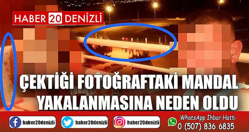 Çektiği fotoğraftaki mandal yakalanmasına neden oldu