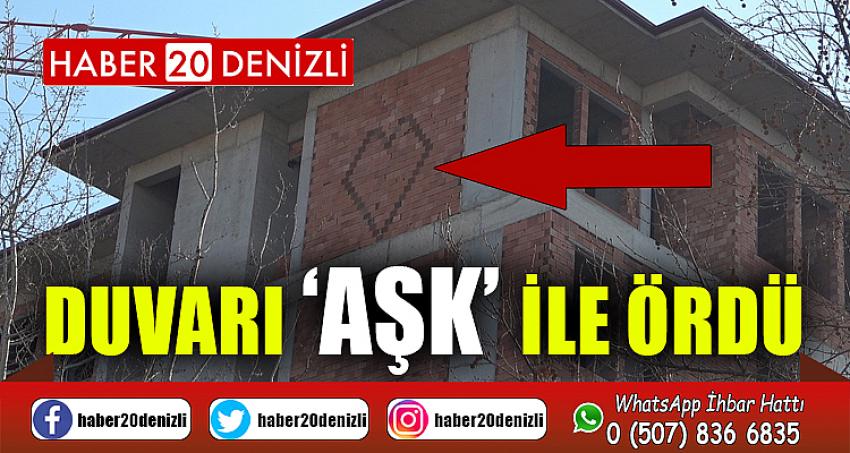 Duvarı ‘aşk’ ile ördü