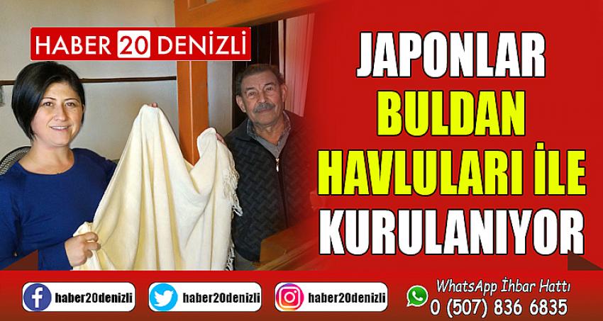 Japonlar Buldan havluları ile kurulanıyor