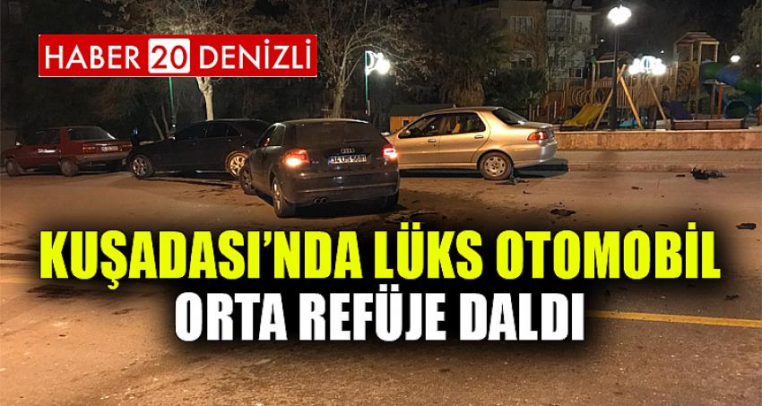 Kuşadası’nda lüks otomobil orta refüje daldı