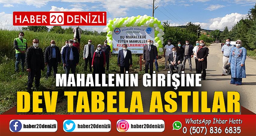 7 ayda 72 kişi sigarayı bırakınca mahallenin girişine dev tabela astılar