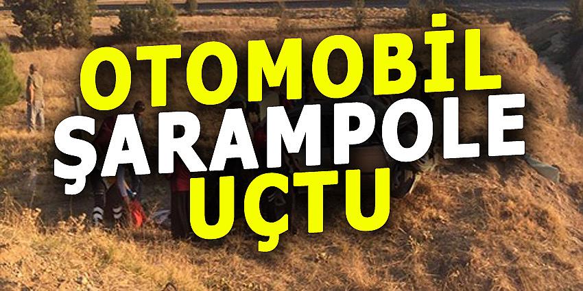 OTOMOBİL ŞARAMPOLE DEVRİLDİ