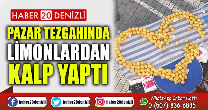 Pazar tezgahında limonlardan kalp yaptı