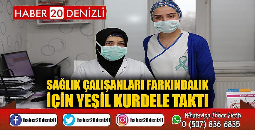 Sağlık çalışanları farkındalık için yeşil kurdele taktı