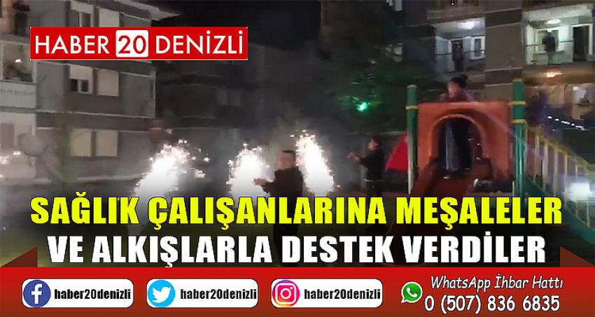 Sağlık çalışanlarına meşaleler ve alkışlarla destek verdiler