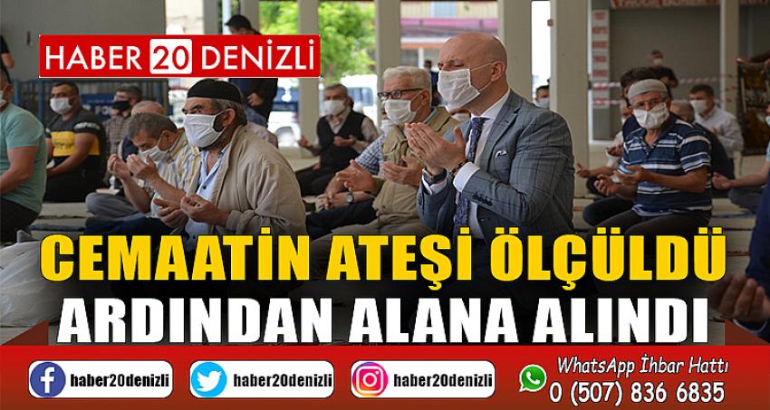 Sarayköy’de cemaatin ateşi ölçüldü ardından alana alındı