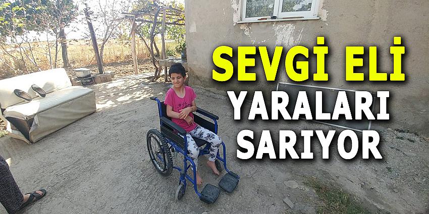 SEVGİ ELİ YARALARI SARIYOR