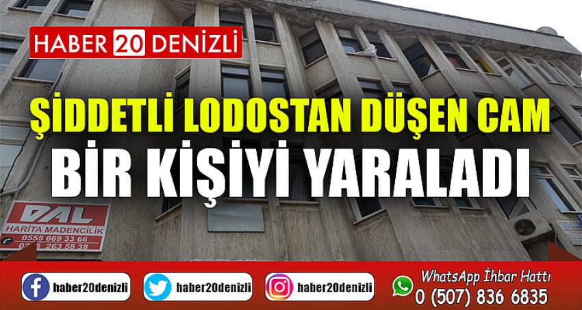Şiddetli lodostan düşen cam bir kişiyi yaraladı