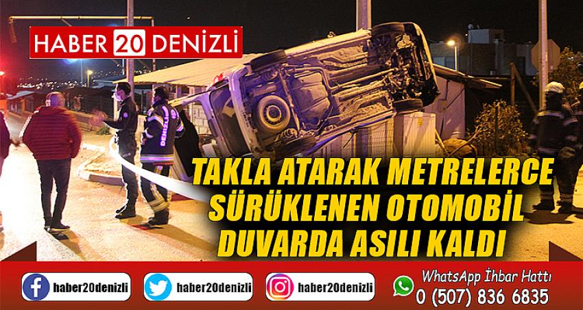 Takla atarak metrelerce sürüklenen otomobil duvarda asılı kaldı