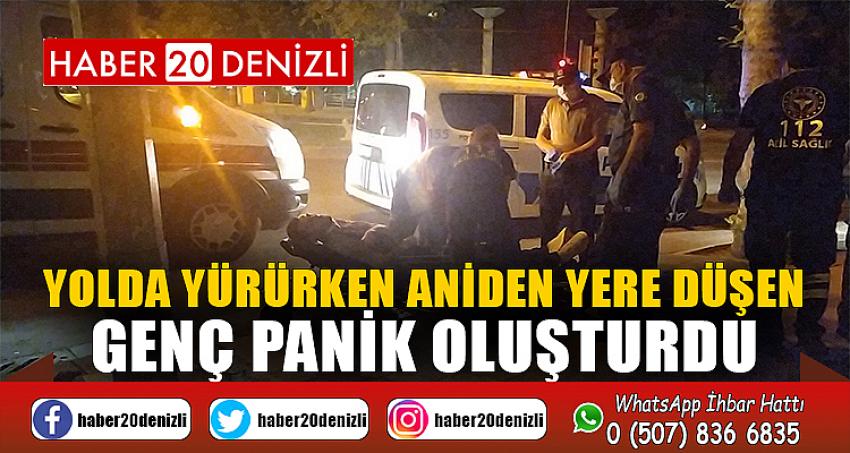 Yolda yürürken aniden yere düşen genç panik oluşturdu