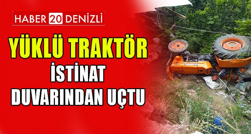 Yüklü traktör istinat duvarından uçtu