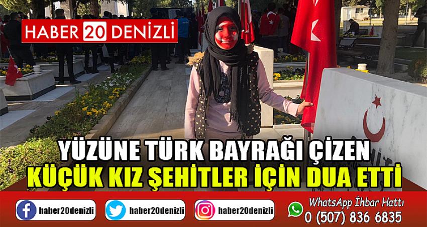 Yüzüne Türk bayrağı çizen küçük kız şehitler için dua etti